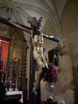 La comunidad de Alcalá del Río celebra misa en honor al Santísimo Cristo del Buen Fin.